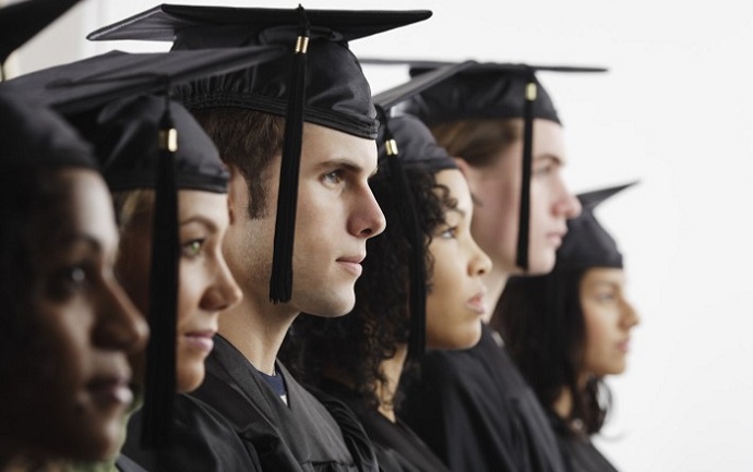 Graduates in Cap and Gown --- Image by © Royalty-Free/Corbis